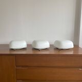 Square wall lights in sandblasted white glass