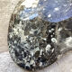 Empty tray pocket in fossilized stone