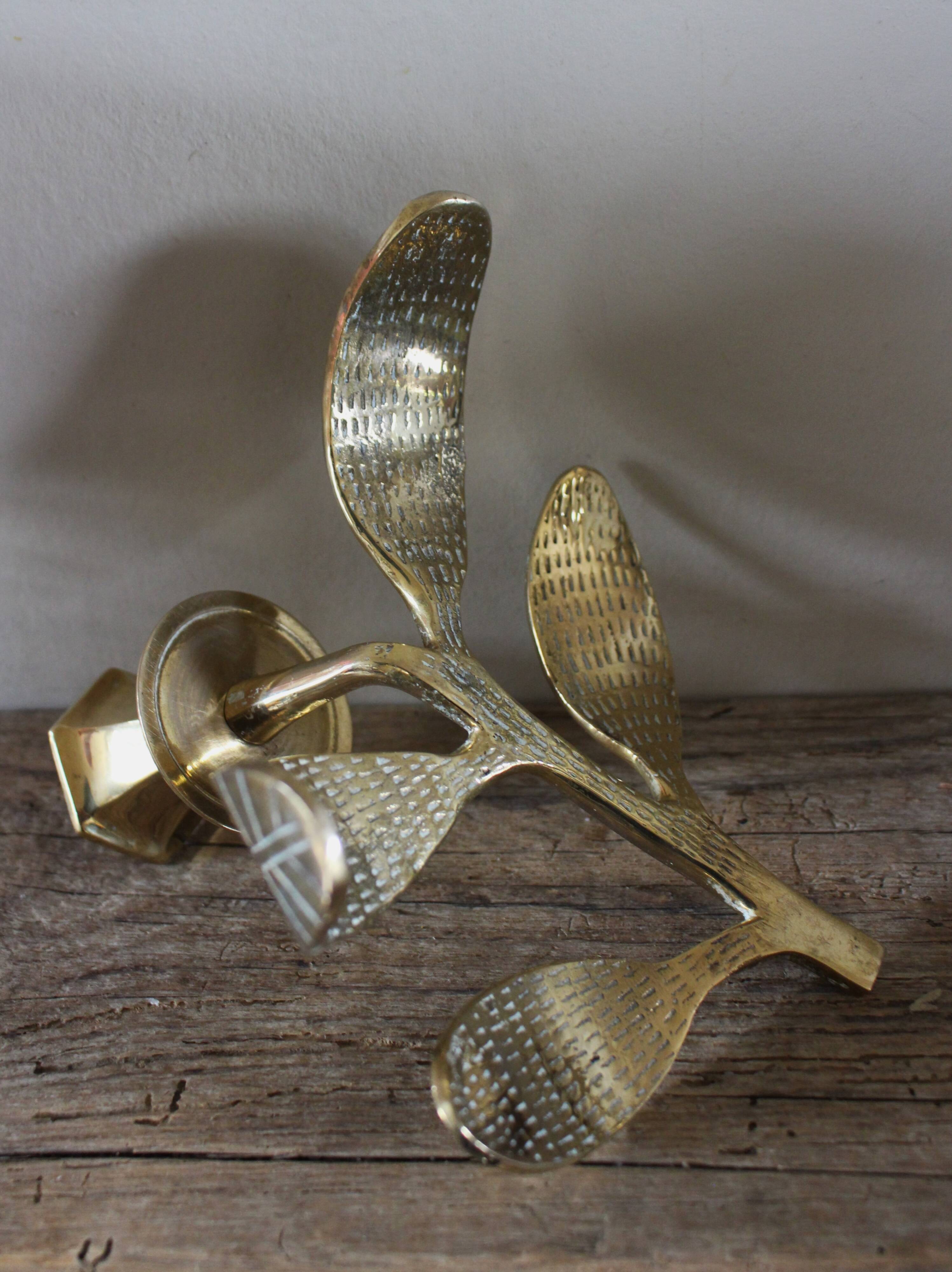 Brass candle holder with oval leaf branch
