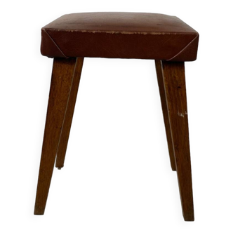Small stool or footrest in wood and leather