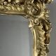 Large gilded wooden mirror in Louis XV style, 19th century.
