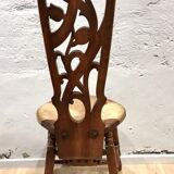 Art Nouveau chair in carved walnut
