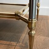 Pair of neoclassical side tables in steel and brass by Maison Jansen.