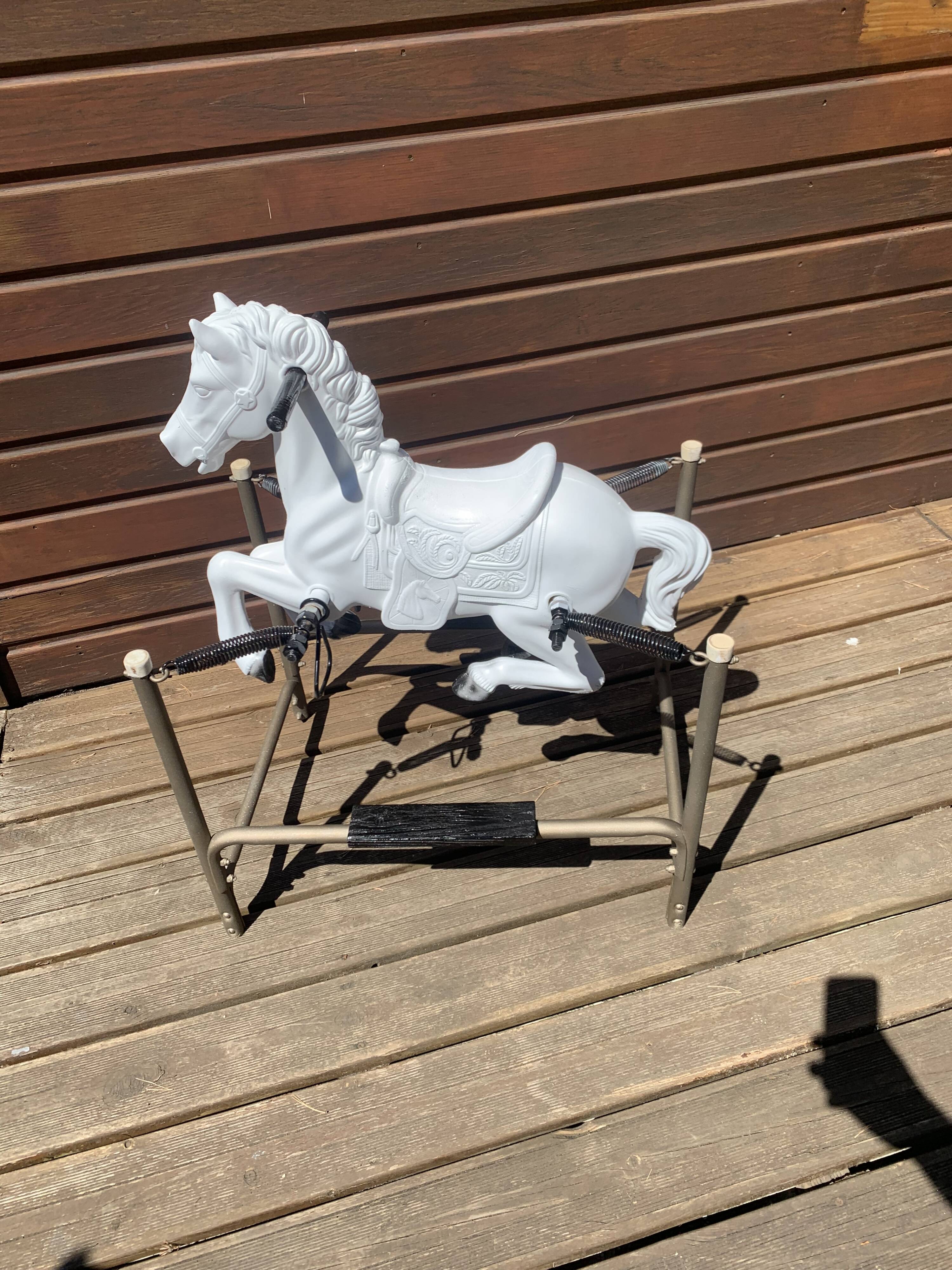 Horse carousel with ressors, 50s