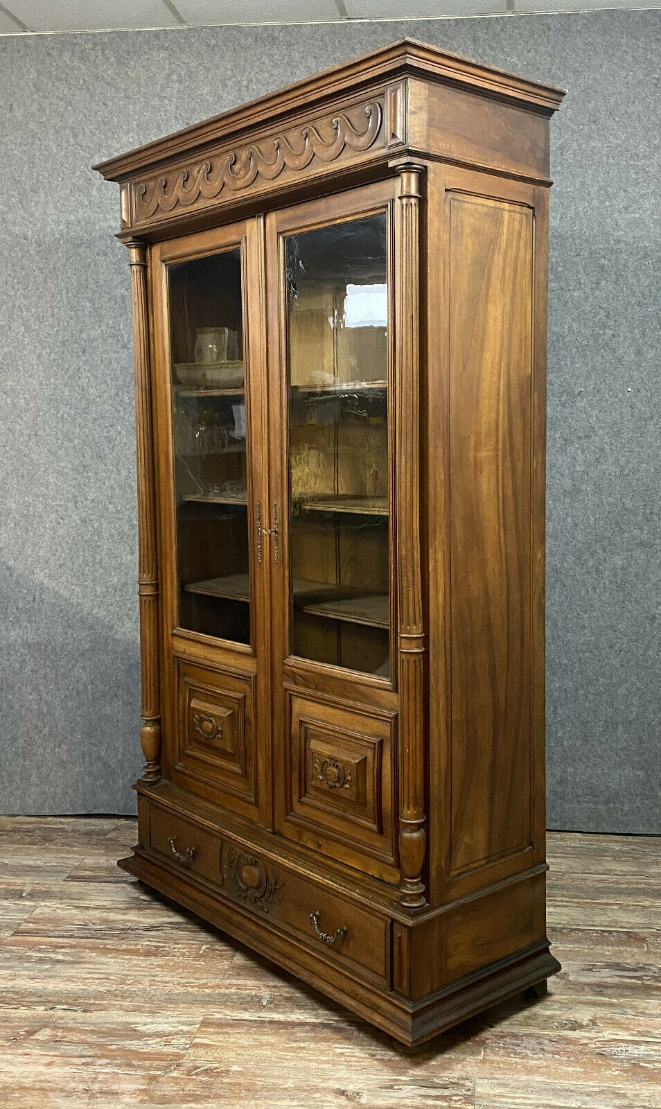 Gothic Renaissance library in solid walnut with columns around 1850