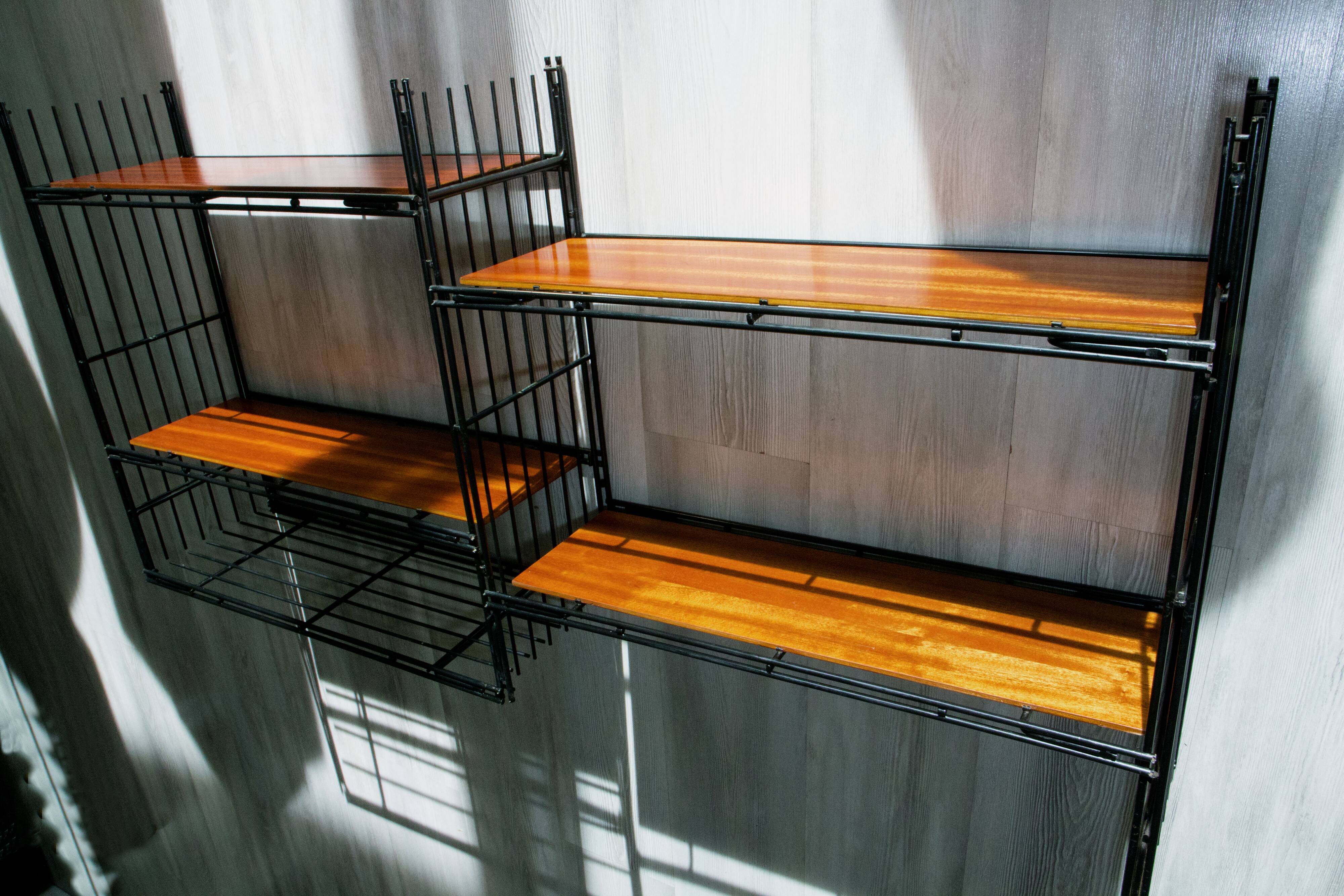 Modular shelves on wall or stand, published by Multimueble 1960