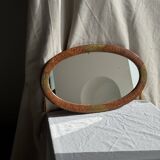 Small oval Art Deco mirror in brown and gold 33x54.