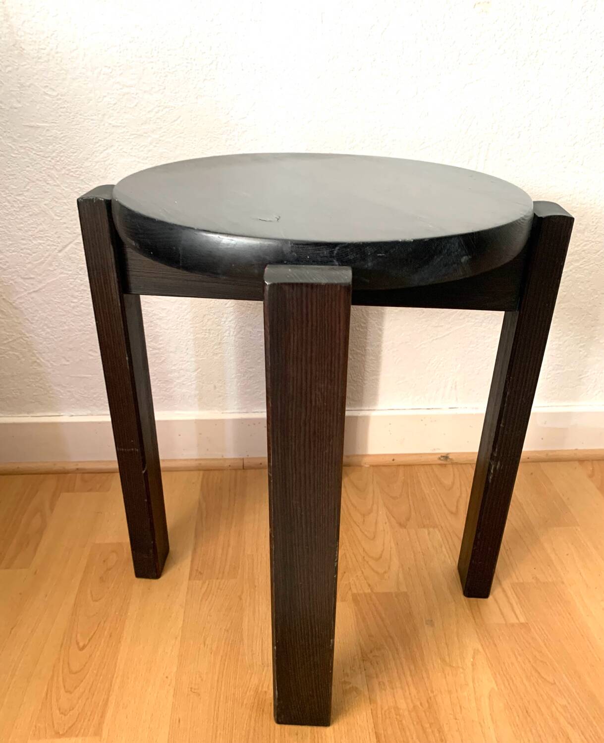 Black lacquered wooden stool