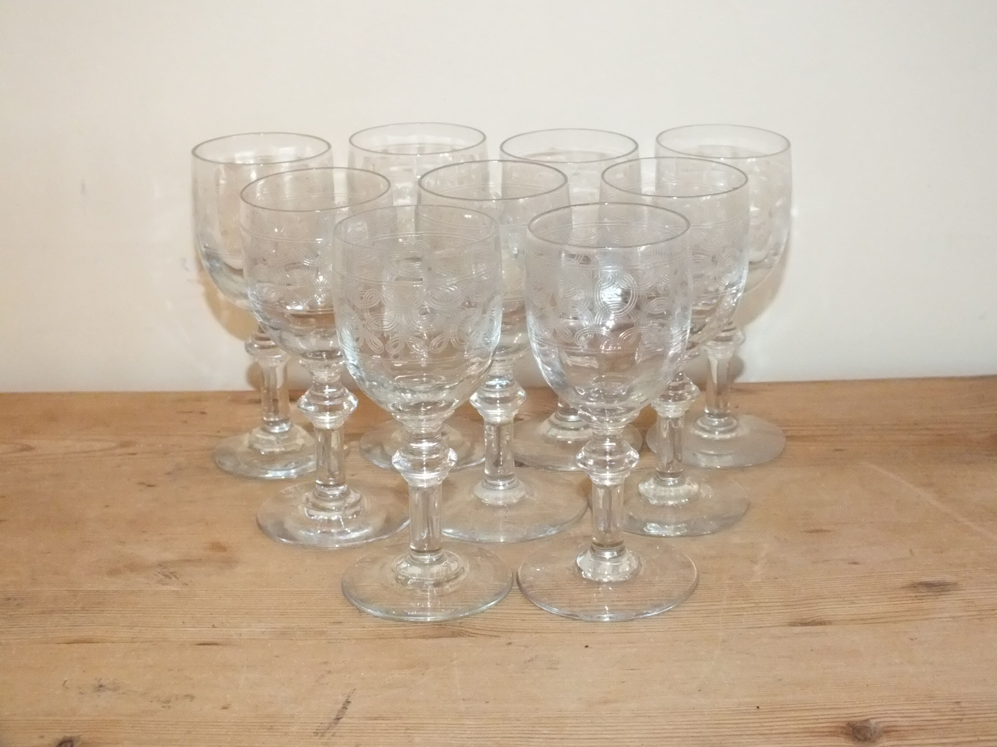 9 antique glasses in port or alcohol decorated with arabesques