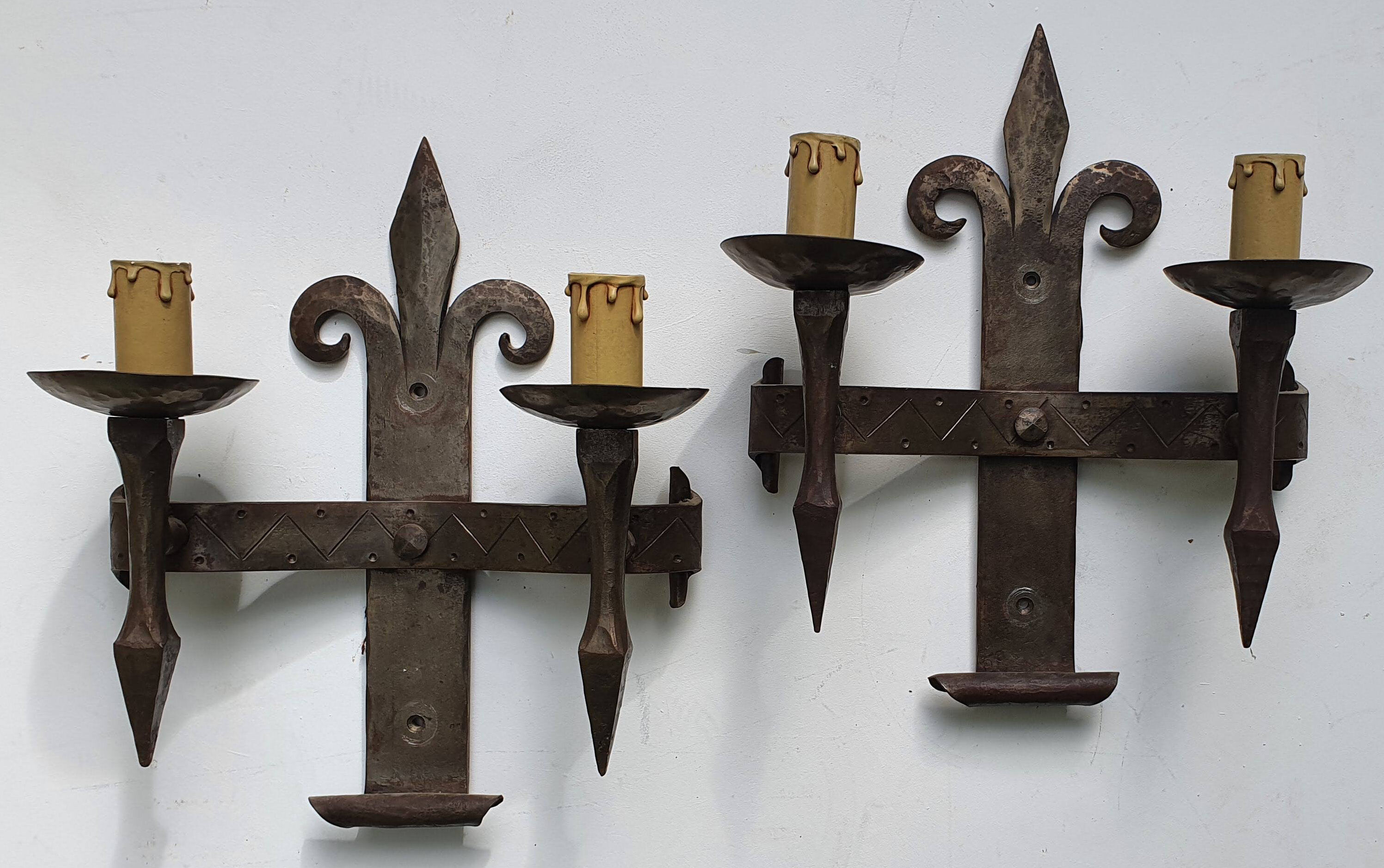 Duo of wrought iron wall lamps Atelier Marolles