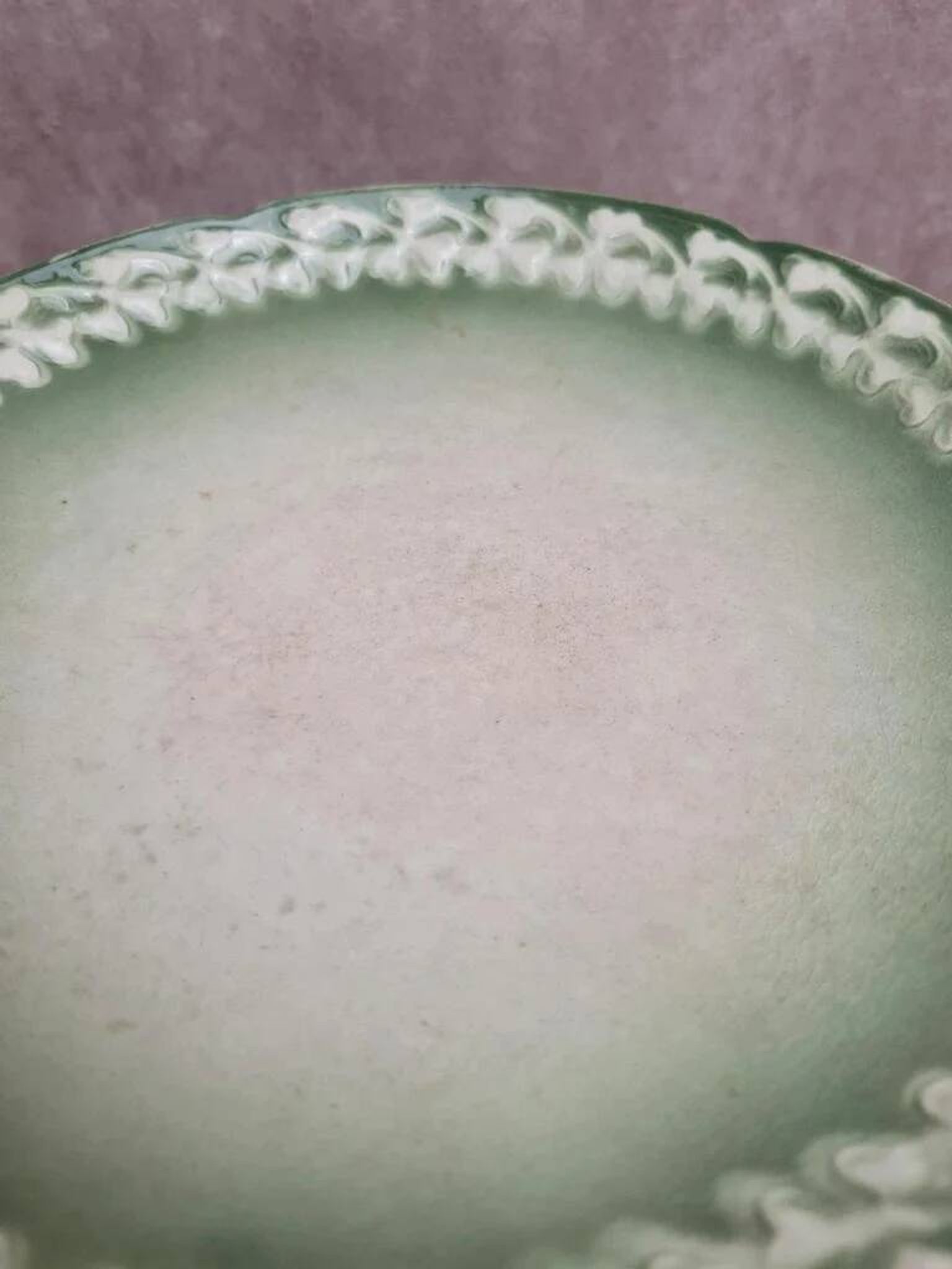 Antique compote stand Lunéville St Clément with green clover decoration.