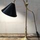 Old lamp in gilded bronze and brass with black enamel lampshade