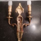 Pair of Louis XVI style sconces in gilded bronze