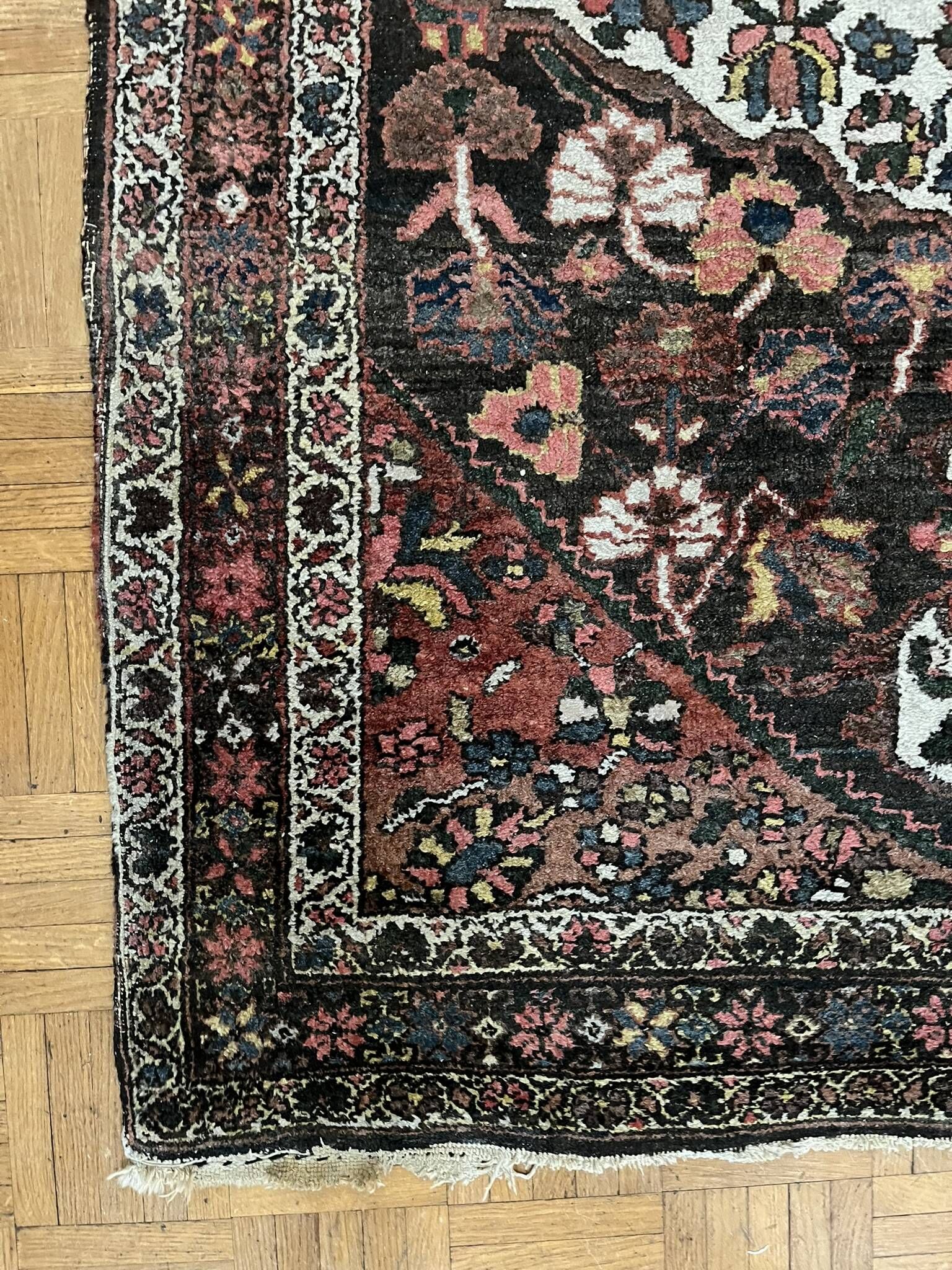 Antique handmade Hamadan Persian rug, ivory medallion on dark background 148x103.