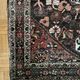 Antique handmade Hamadan Persian rug, ivory medallion on dark background 148x103.