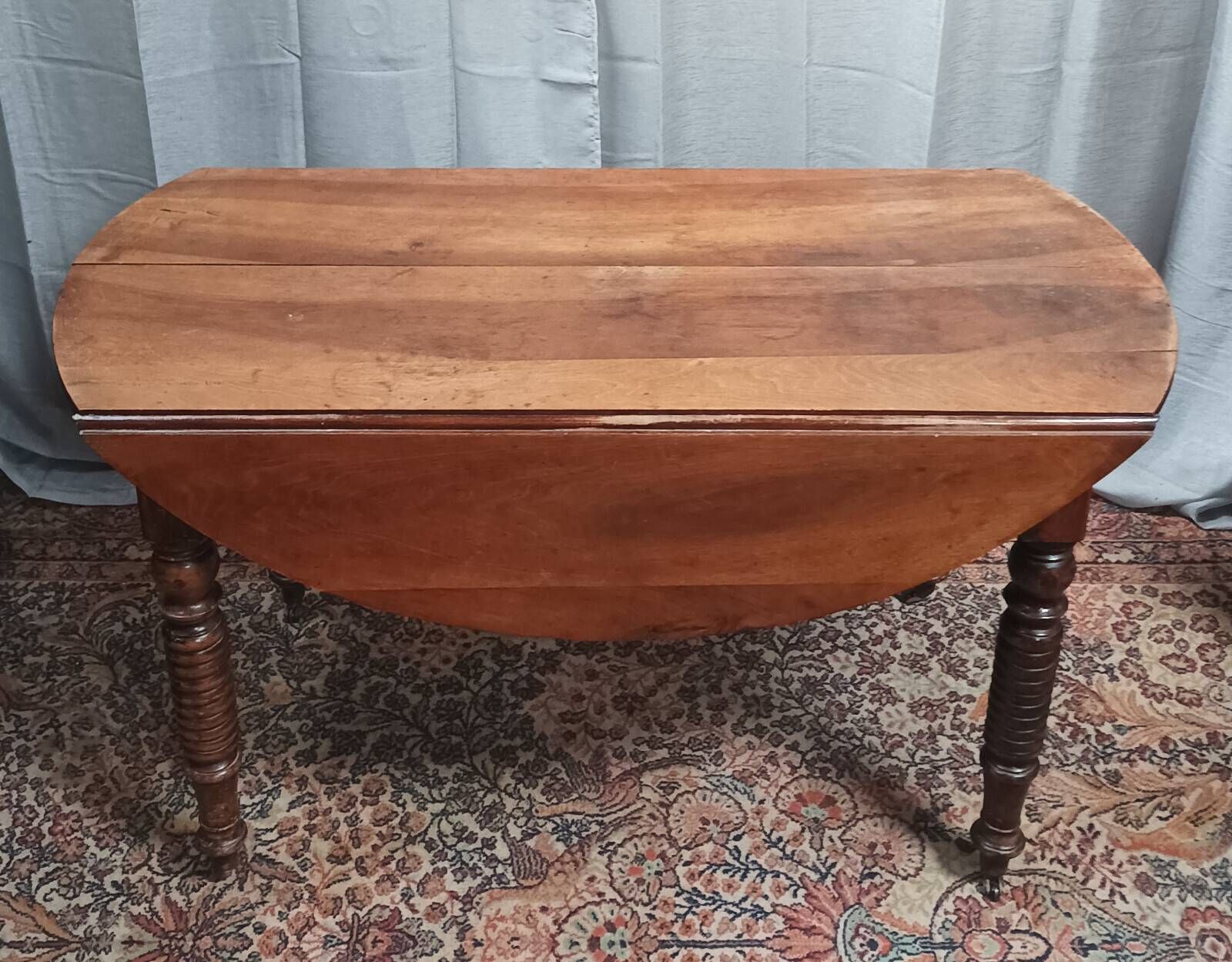 19th-century Louis Philippe walnut drop-leaf table.
