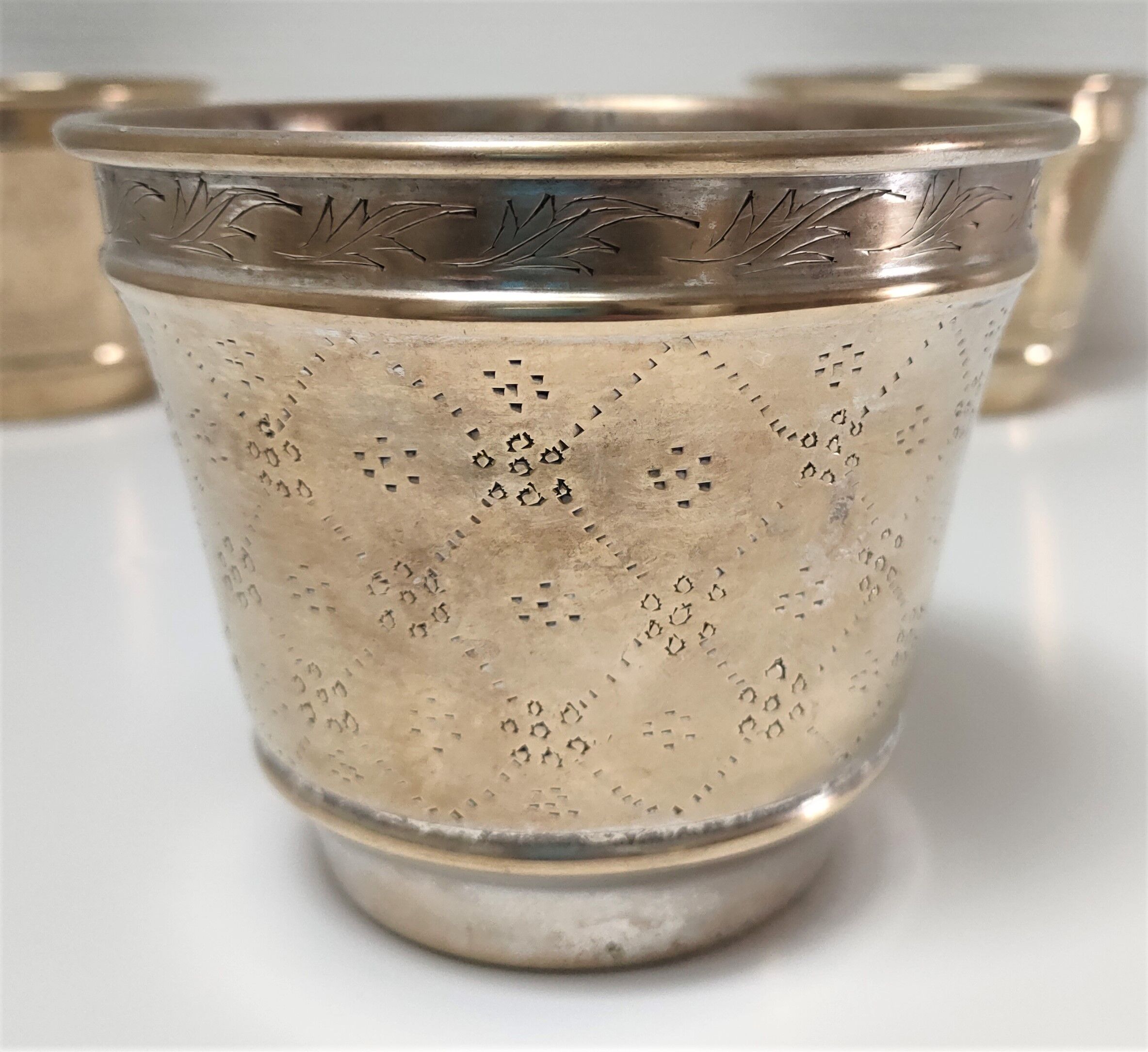 Three pot covers brass silver cover golden patina monogram early twentieth century