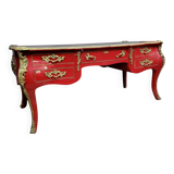 Louis XV style curved center desk in red lacquer and gilded bronze