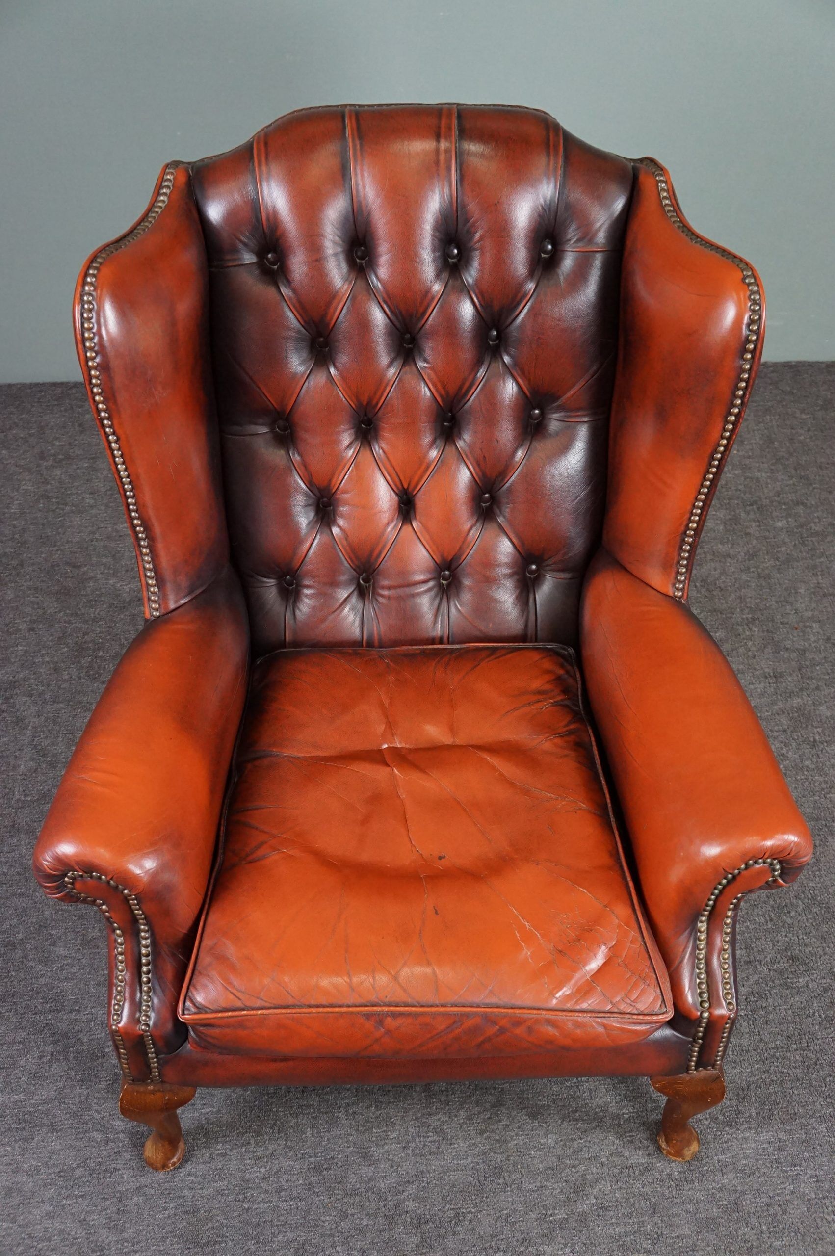 Fauteuil Chesterfield en cuir de vachette