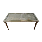 Coffee table in onyx and brass