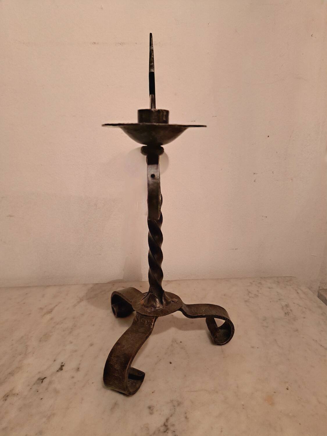 Black wrought iron fleur-de-lis candlestick
