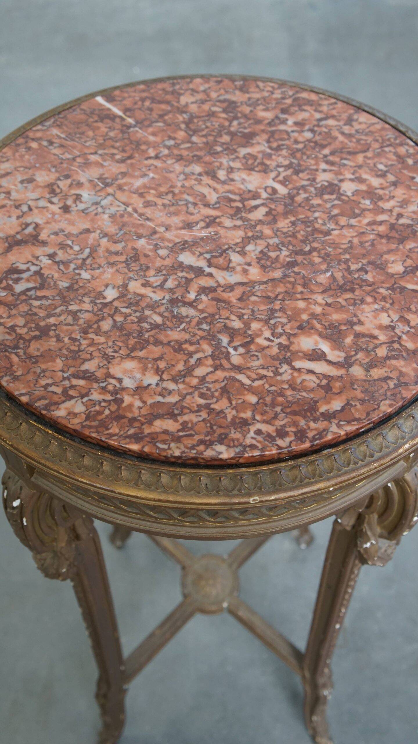 Antique French side table with a gold-coloured wooden frame and marble top