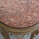 Antique French side table with a gold-coloured wooden frame and marble top