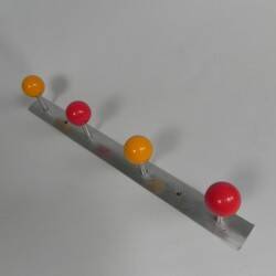 Wall-mounted coat rack with colored balls, 1950s