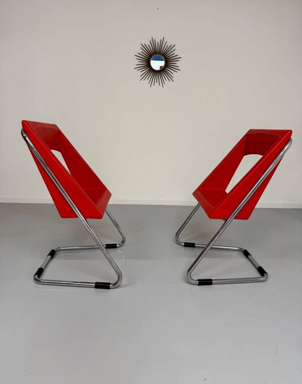 2 chaises tubulaire en simili rouge, années 80 en simili rouge