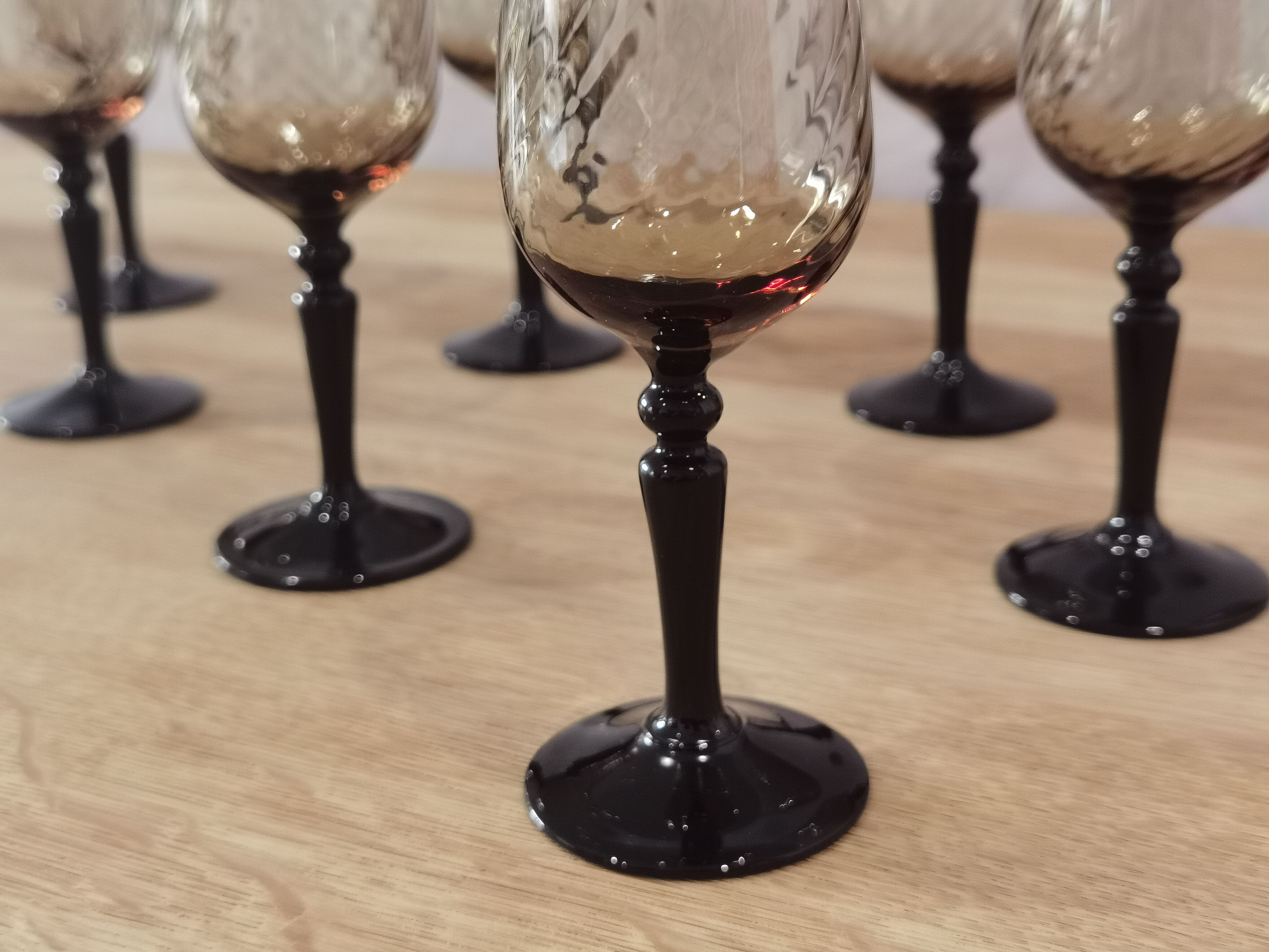 8 vintage smoked champagne flutes with black feet Arcoroc