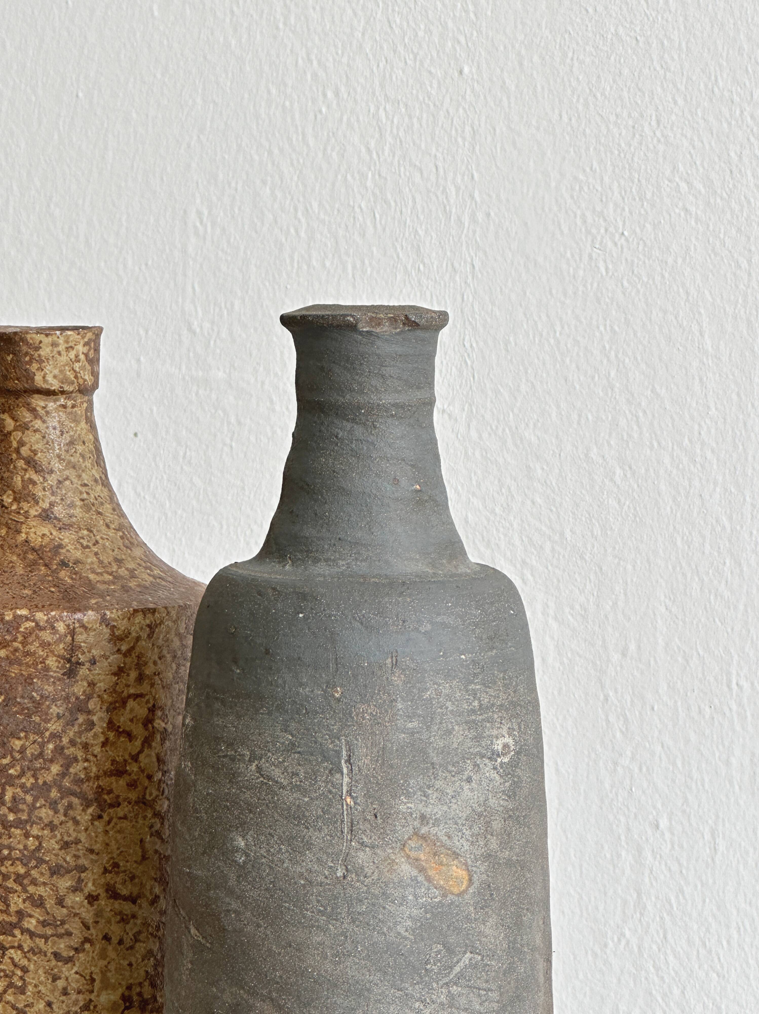 Lot de 3 bouteilles anciennes en grès