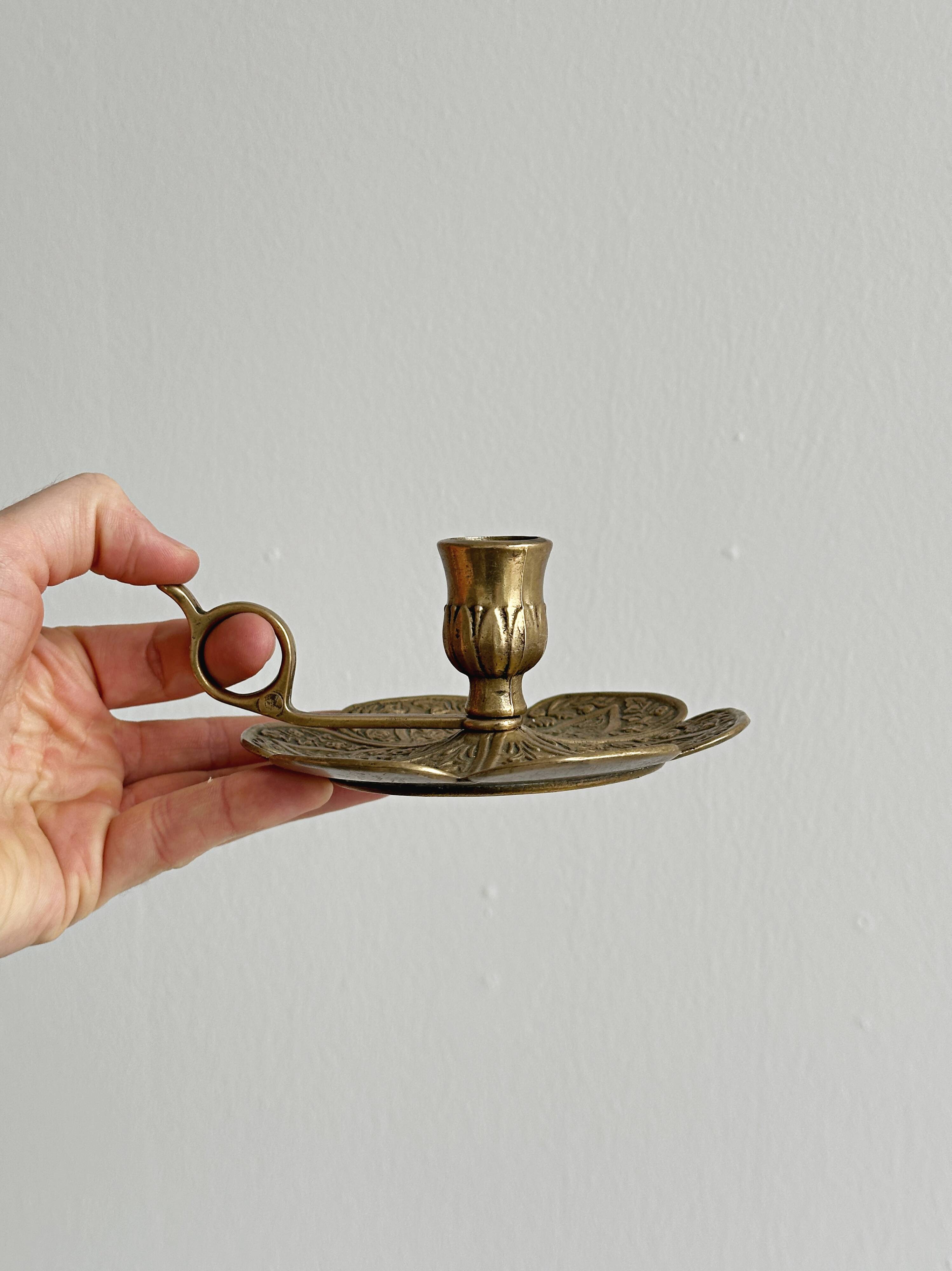 Brass candlestick with handle