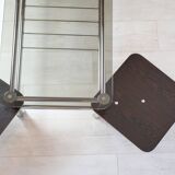 Chrome metal coffee table with smoked glass top.