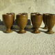 Eight vintage stoneware walking glasses