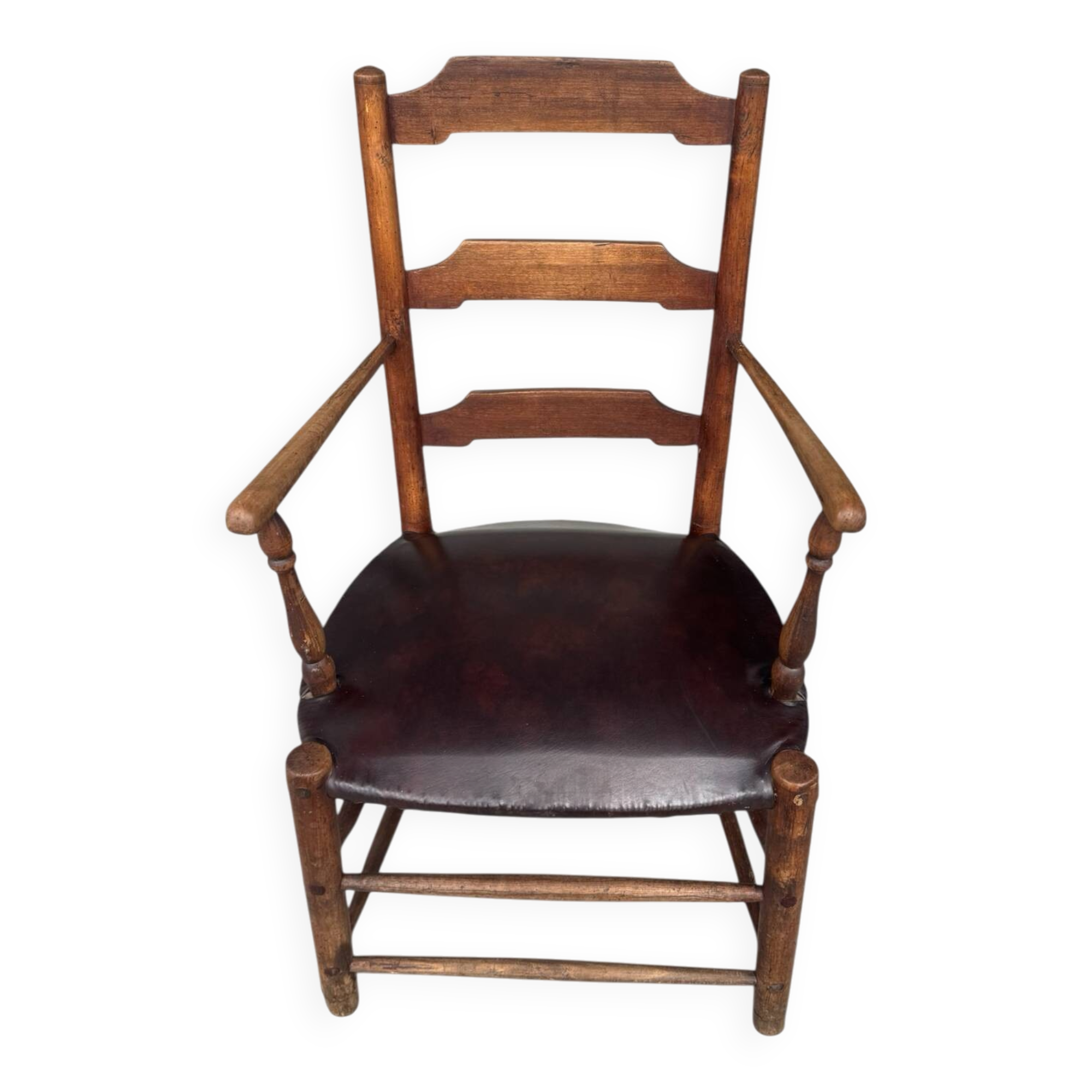 Antique rustic armchair in walnut and leather, 18th century.