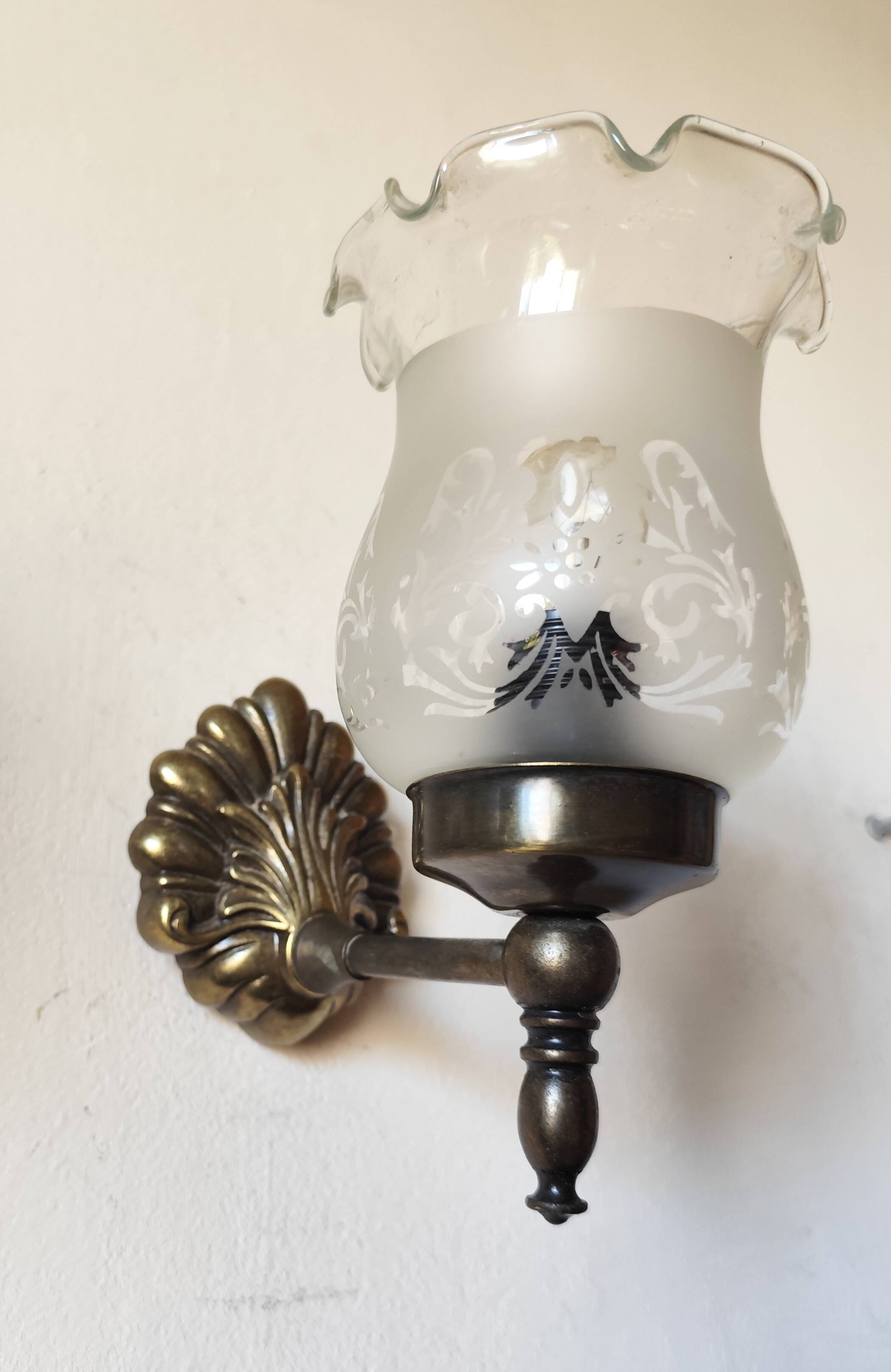 Pair of wall sconces in bronze with opaline glass tulips.