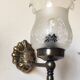 Pair of wall sconces in bronze with opaline glass tulips.