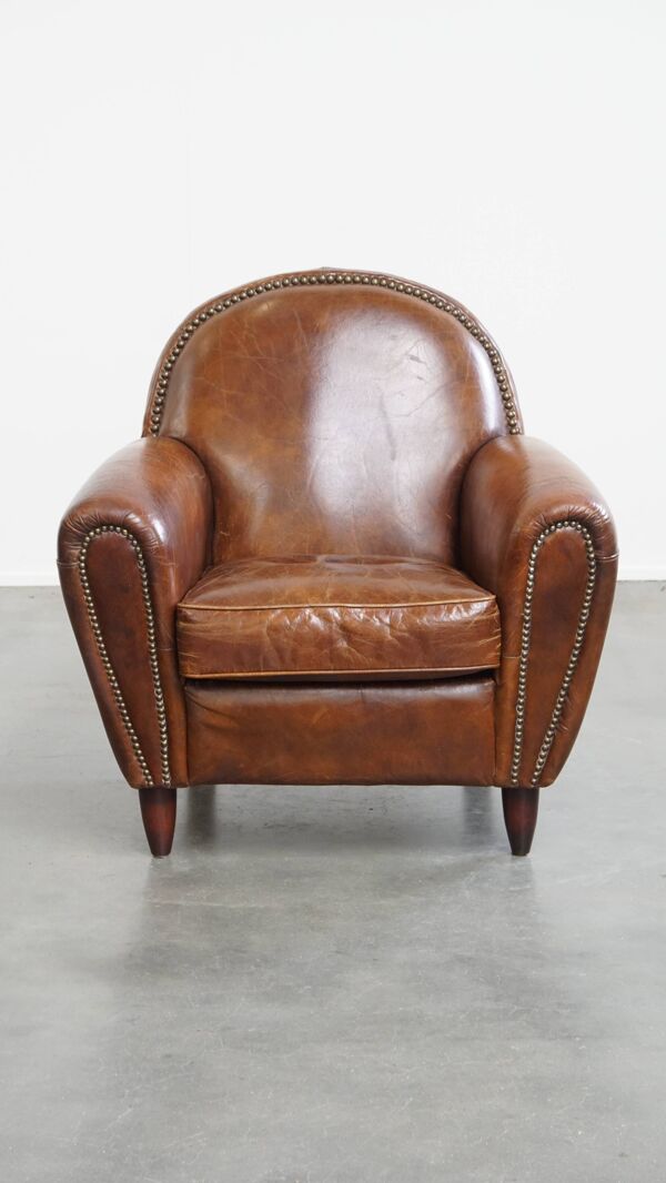 Fauteuil en cuir de vache marron