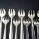 12 Saint Médard silver-plated oyster forks