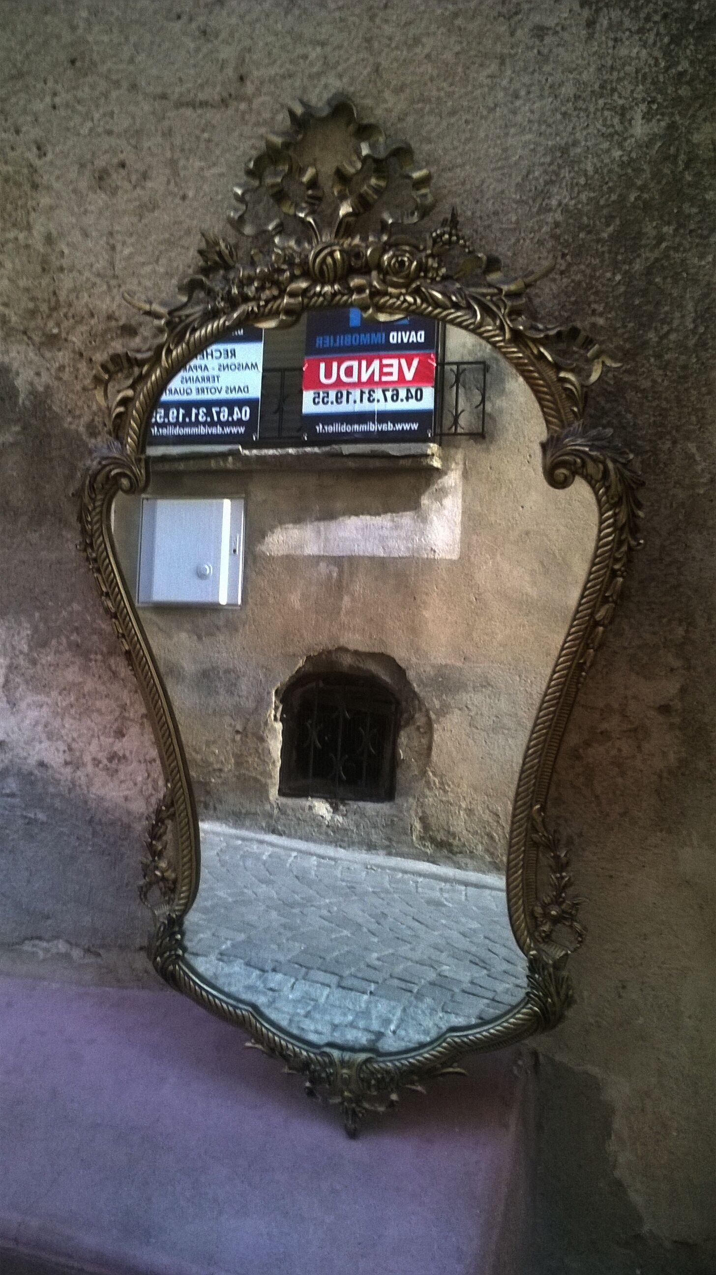Mirror style Louis XV in bronze