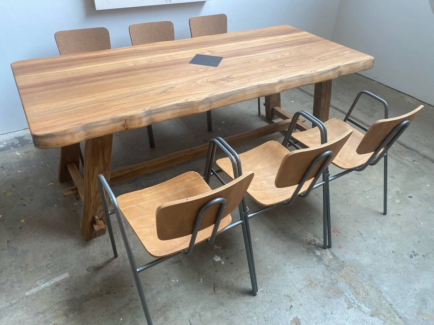 Brutalist Aranjou style table in elm and 6 Stella chairs.