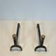 Pair of modernist fire dogs in wrought iron and brass