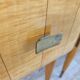 Mid-century nightstands in maple, brass, and glass