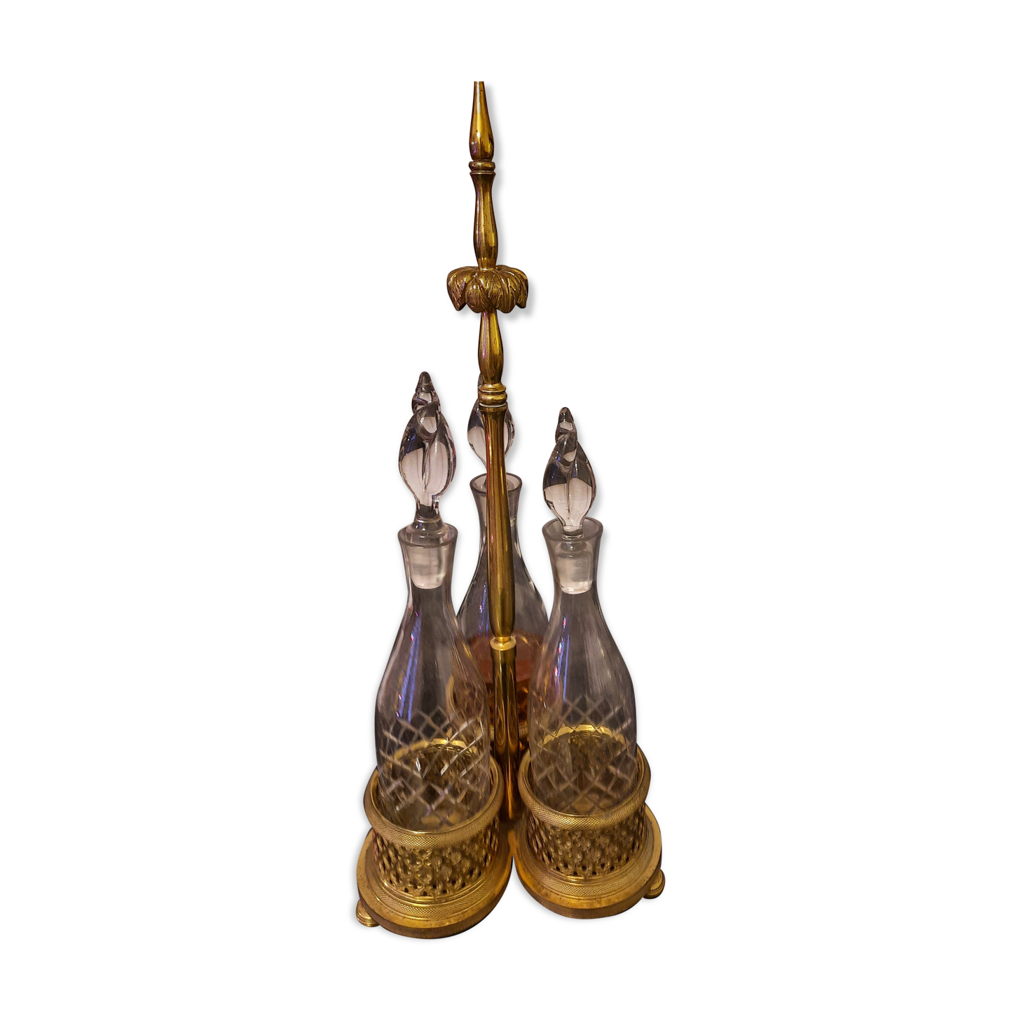 3 crystal decanters diamond cut set of 3 crystal decanters in a gold gold support,