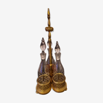 3 crystal decanters diamond cut set of 3 crystal decanters in a gold gold support,