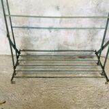 Rigid metal shoe shelf on legs - 1950