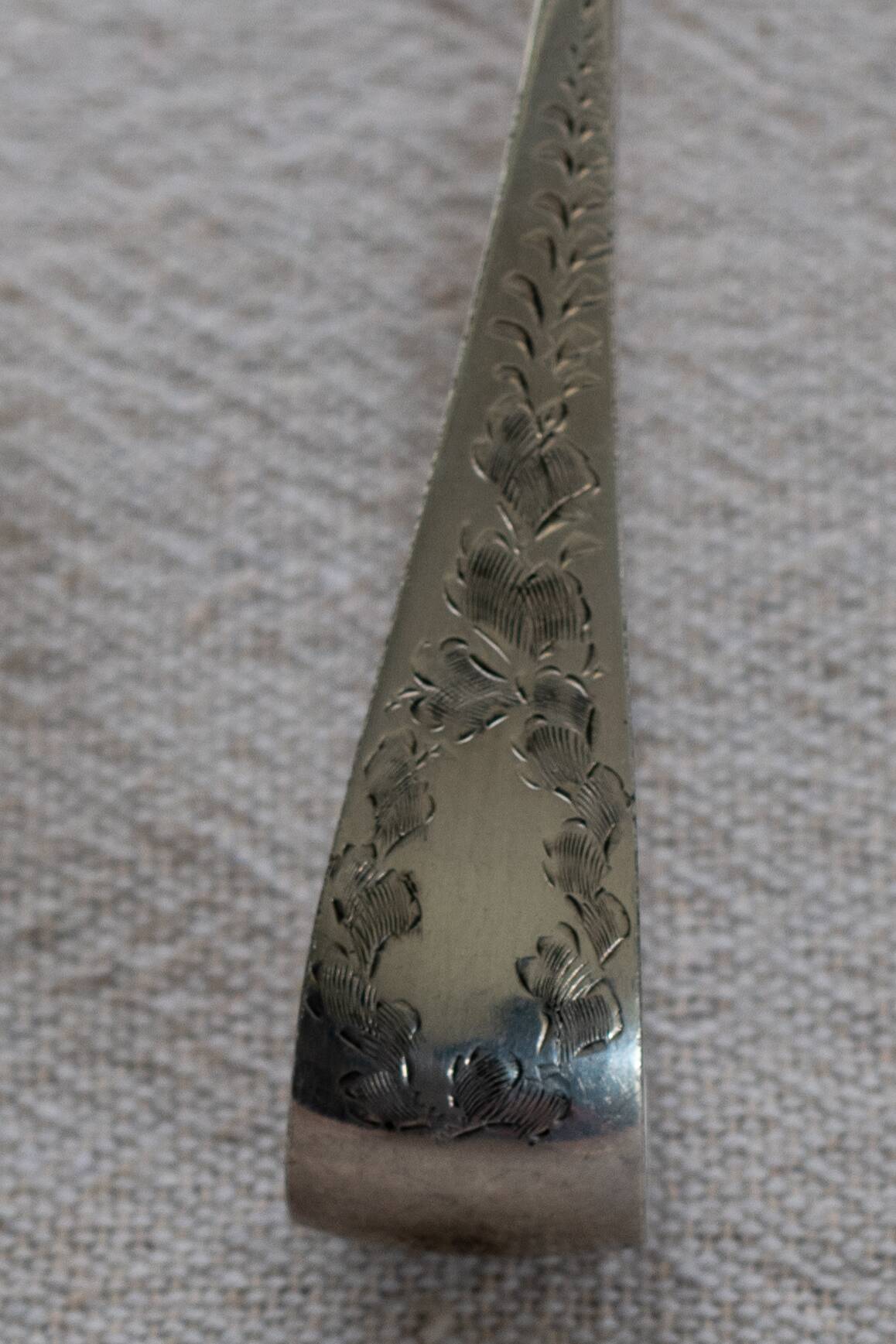Box of old English coffee or tea spoons and their sugar tongs, silver plated
