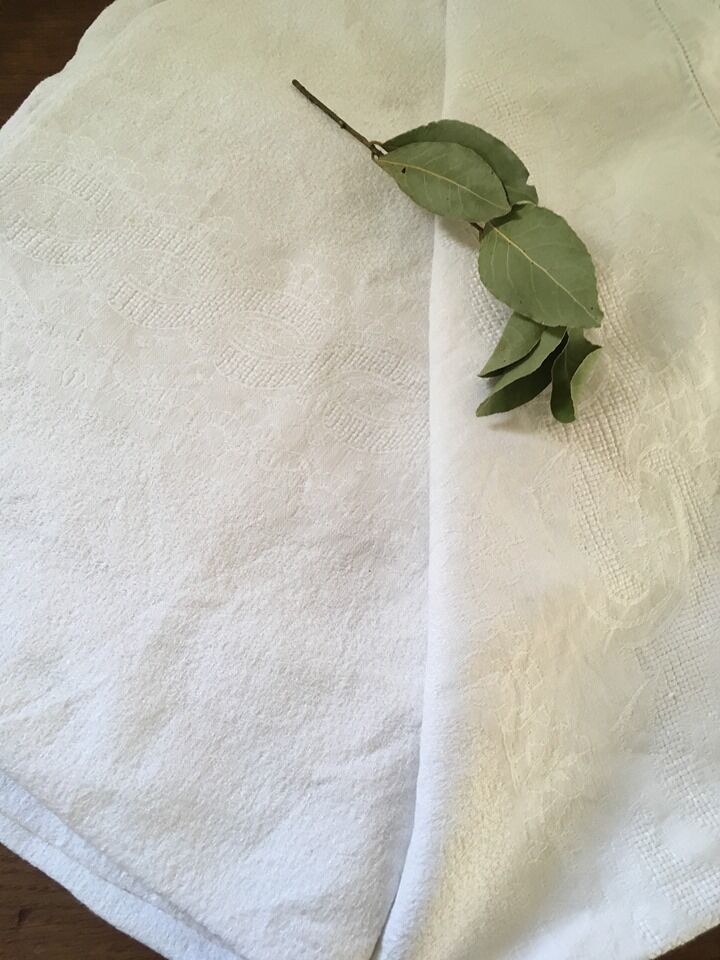 Old damascened white tablecloth