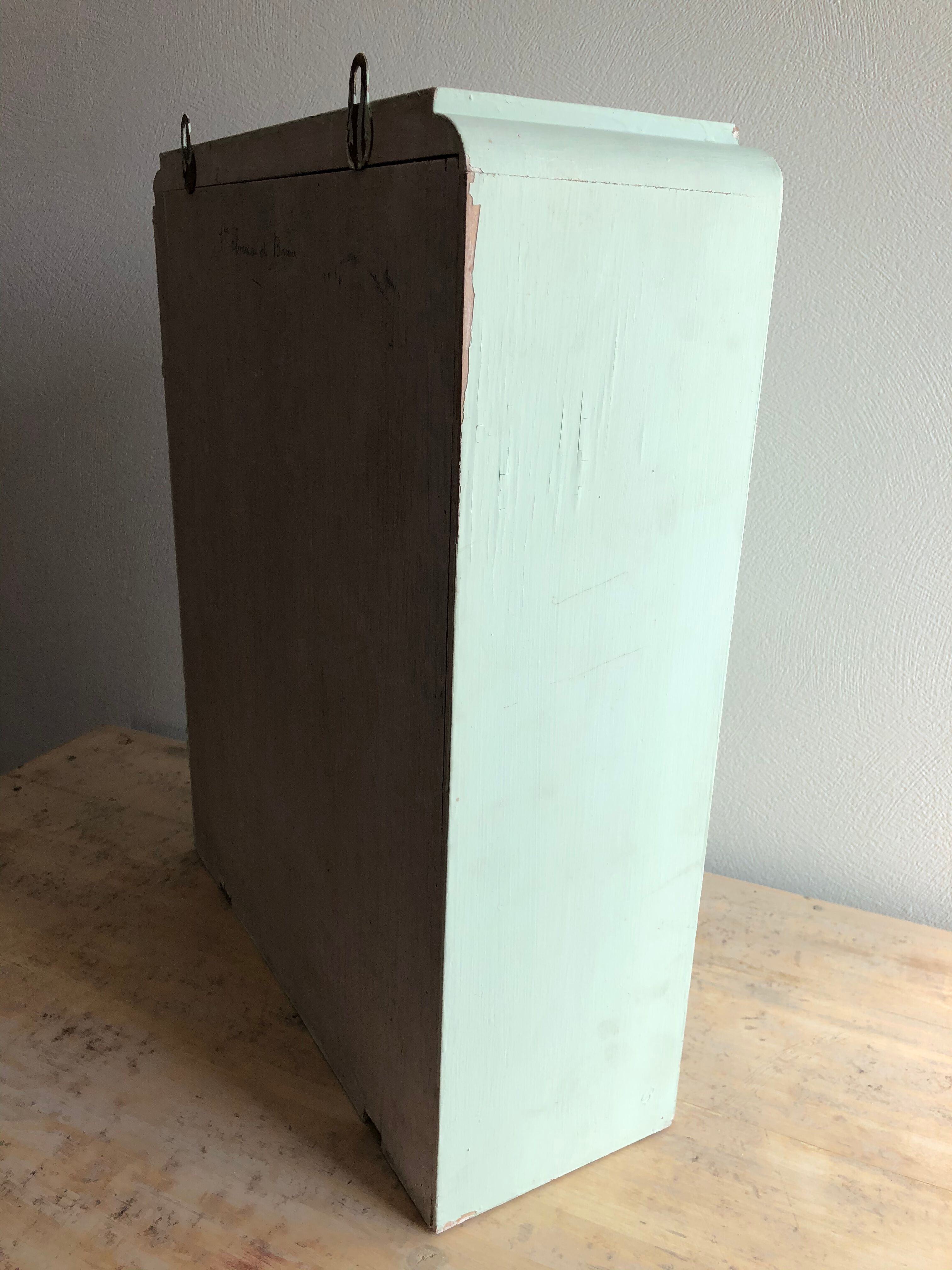 Patinated medicine cabinet