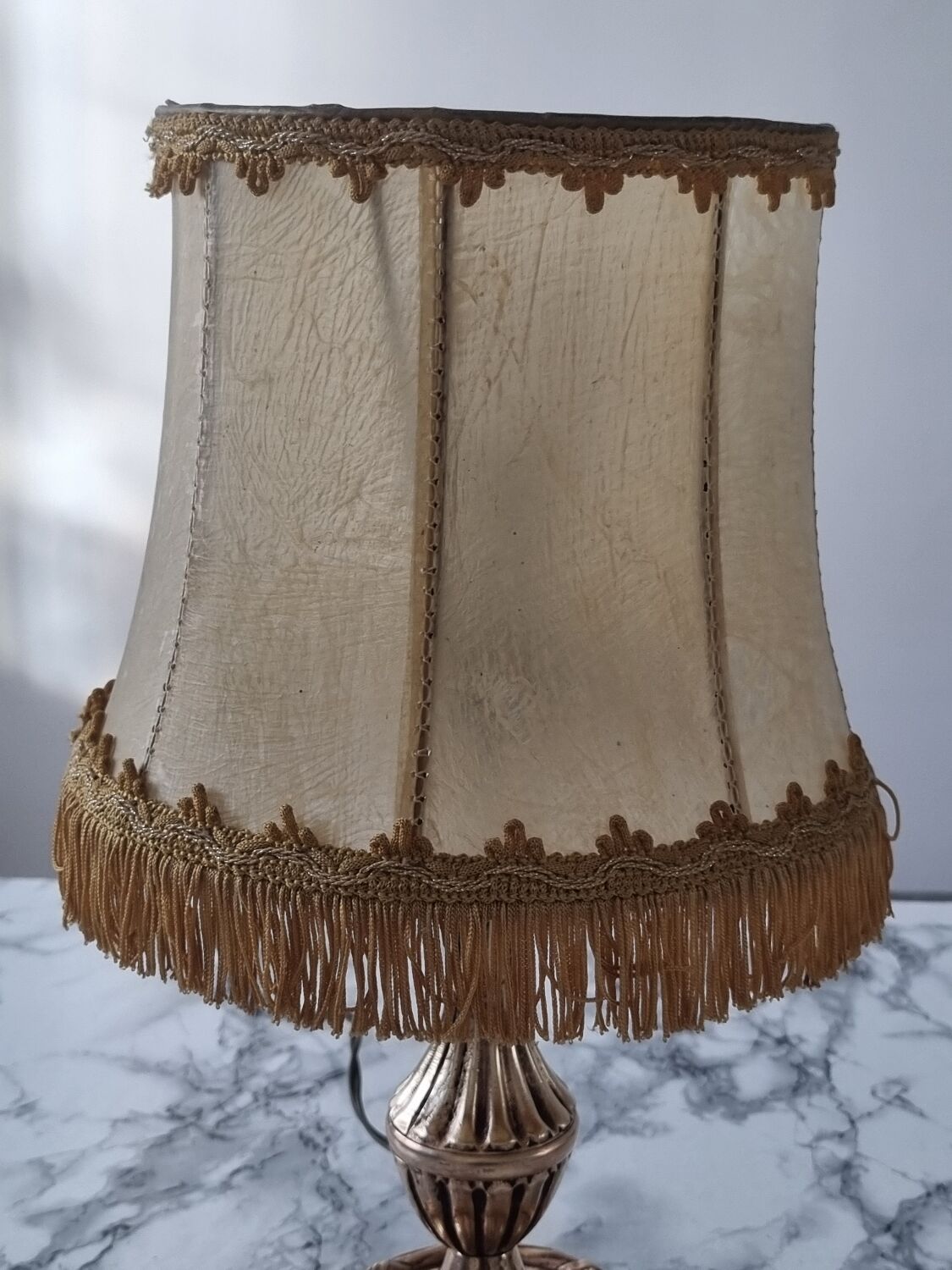 Brass lamp with vintage mother-of-pearl lampshade